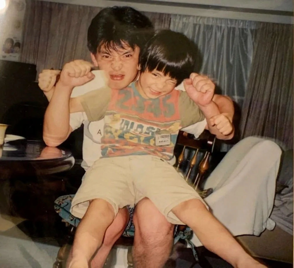 優里と父親の写真